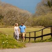 a couple on a countryside walk