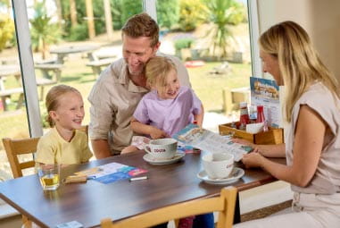 a family enjoying a meal at the restaurant