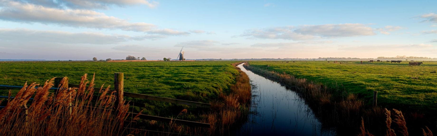a river running through green countryside
