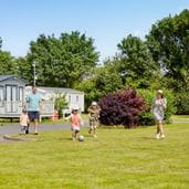A family playing in the park