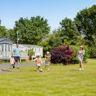 A family playing in the park