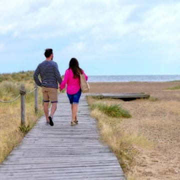 a couple taking a country walk