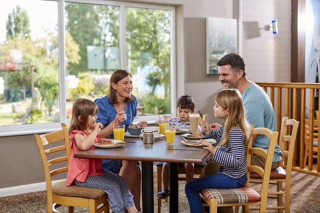 family enjoying a meal in the restaurant