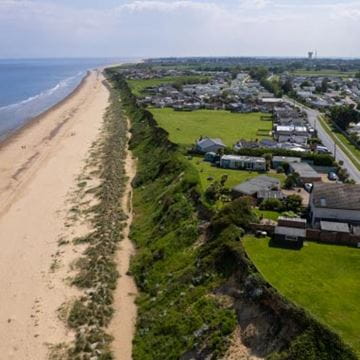 Sprawling countryside by a beach