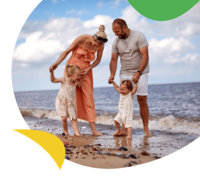 Parents and children playing on beach