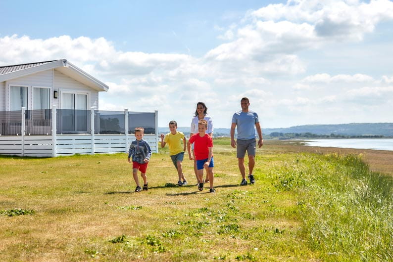 a family walking through the green park dean resort