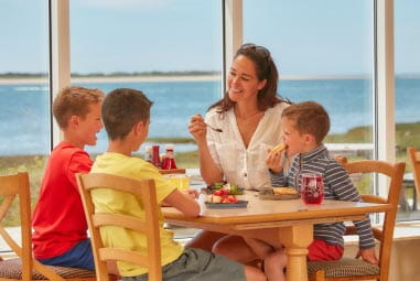 a family enjoying a meal at the restaurant
