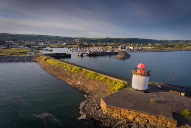 A lighthouse in a picturesque bay