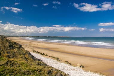a picturesque beach on a summer day