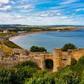 an ancient castle on the coast line
