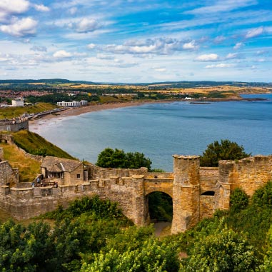 an ancient castle on the coast line