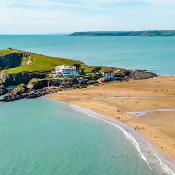 a picturesque island with blue skies