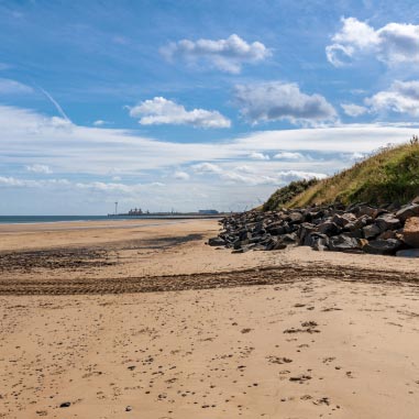 Sandy beach and blue skies