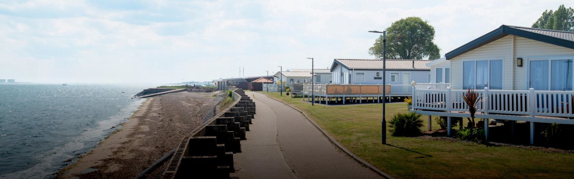 Holiday park homes with terraces by the sea