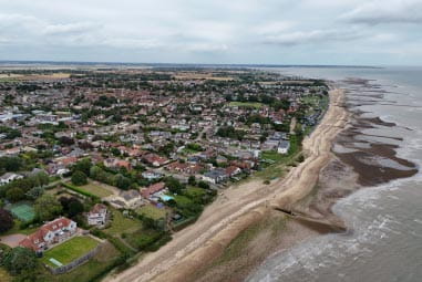 Arial view of beautiful, leafy, coastal town