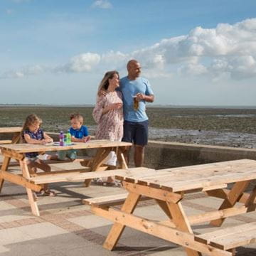 Family enjoying a coastal view