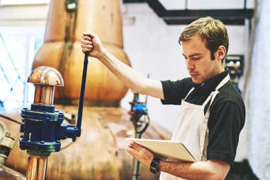 A man working in a brewery