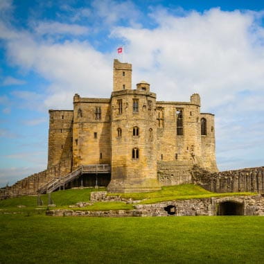 an ancient castle on a hill