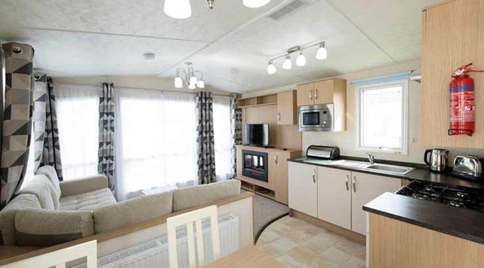 A caravan kitchen and living room interior