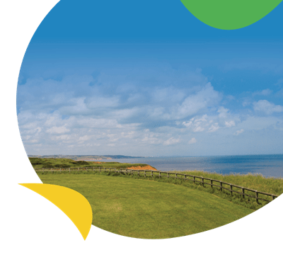A touring field looking out to sea at Crimdon Dene Holiday Park