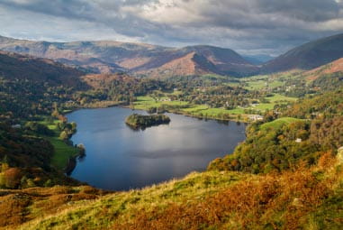 Scenic lake surrounded by hills