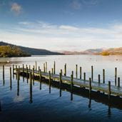 Wooden pier over a vast lake