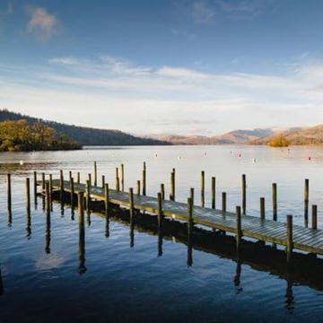 Wooden pier over a vast lake
