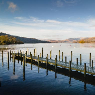Wooden pier over a vast lake