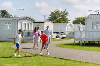children playing football in a park dean resort