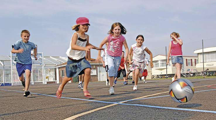 children playing football