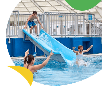 Boy on water slide at Heacham Beach Holiday Park