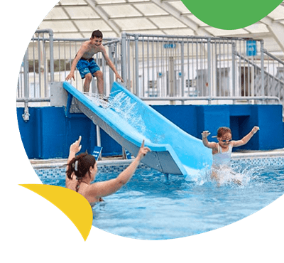 Boy on water slide at Heacham Beach Holiday Park