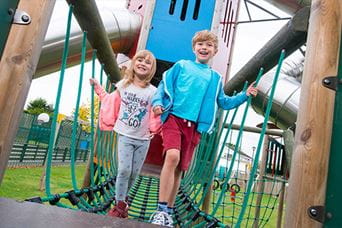 Kids playing on the adventure playground