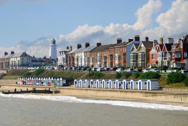 Pretty seaside town with a row of beach huts