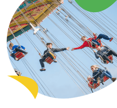 Children on swings at funfair