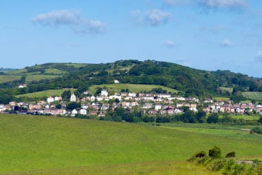 A town surrounded by green fields