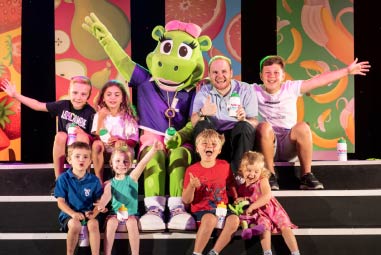 children at a kids club with a park mascot
