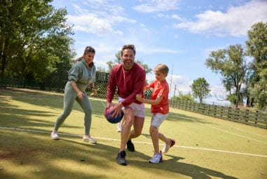 children playing on a multi sports court