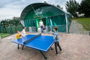 family playing table tennis