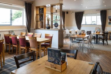 family restaurant with tables and chairs