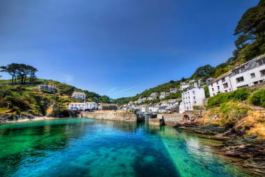 Polperro Bay, with blue skies and waters