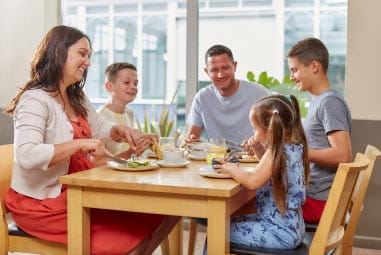 a family enjoying a meal at the restaurant