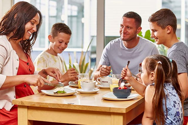 family enjoying a meal in the restaurant