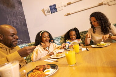 family enjoying a meal in a restaurant