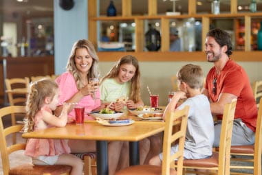 a family enjoying food in the restaurant