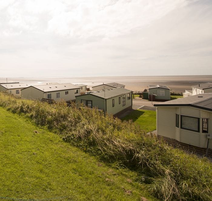 Looking out across caravans to the sea from Ocean Edge Holiday Park