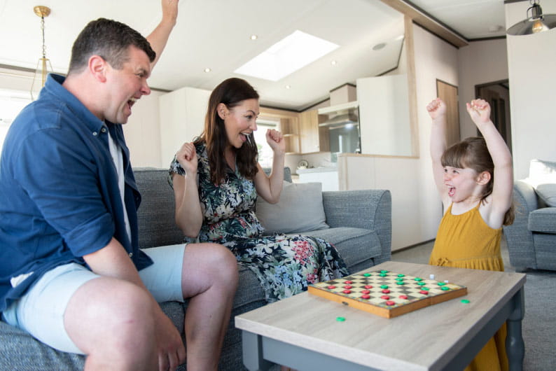 Family playing board game