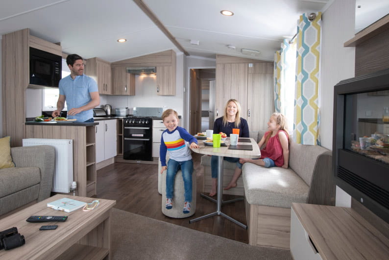 Family sat around dining table