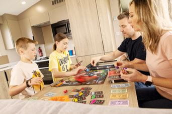Family painting at the dining table