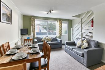 Interior shot of caravan living room and dining table